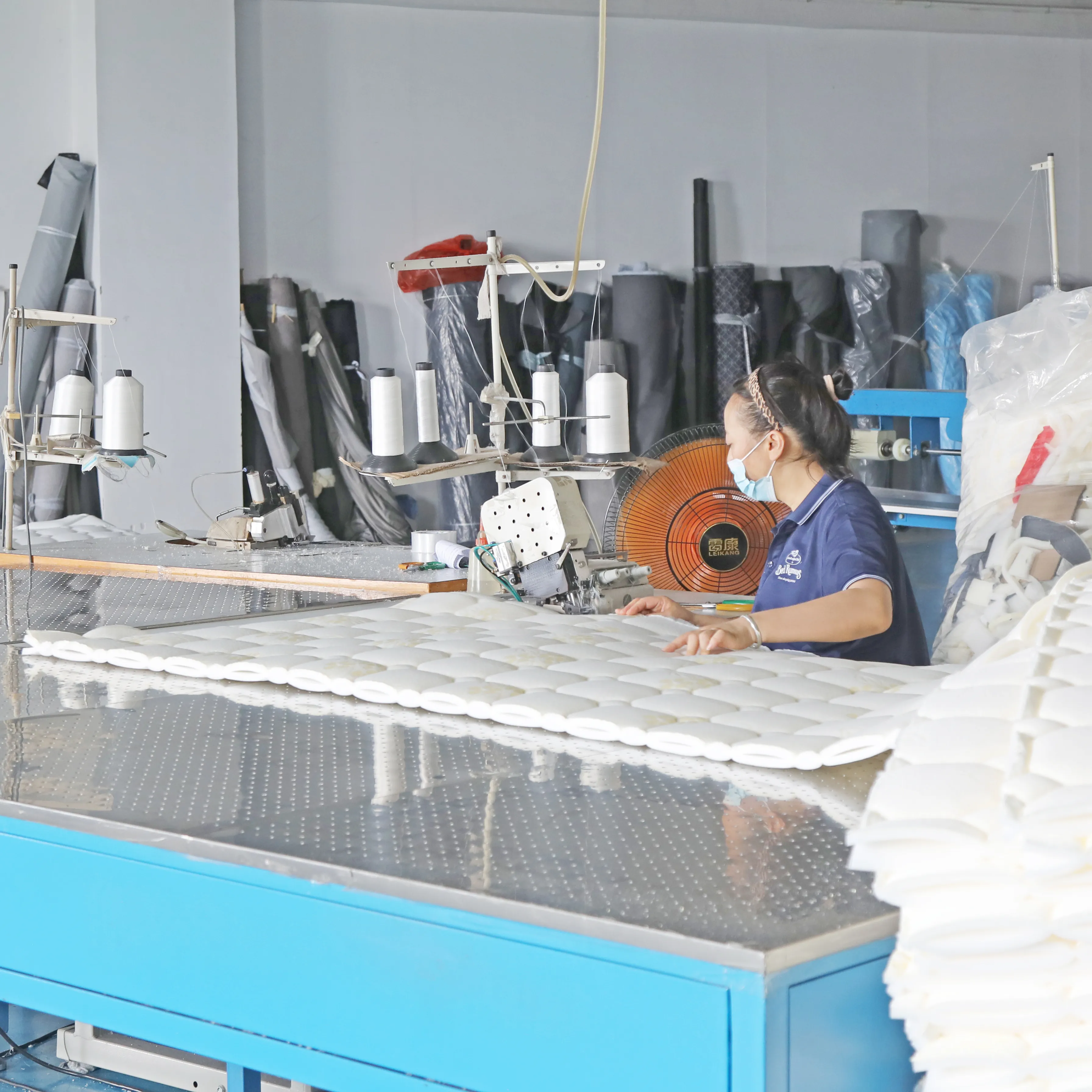 Mattress cover fabric inspection and cutting in Bed Rumours factory
